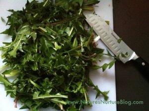 tilapia and dandelion greens on pita