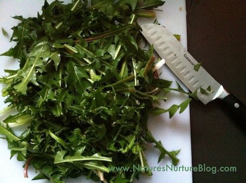 tilapia and dandelion greens on pita