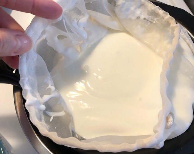 Making homemade yogurt is easier, cheaper, and healthier than store-bought! Try this recipe for plain yogurt and learn how to make thick Greek yogurt too!