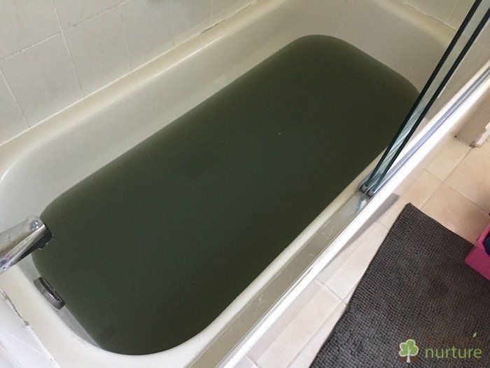 Leftover strip water from stripping a load of sheets and towels. This is what your homemade laundry soap is leaving behind in your fabrics!