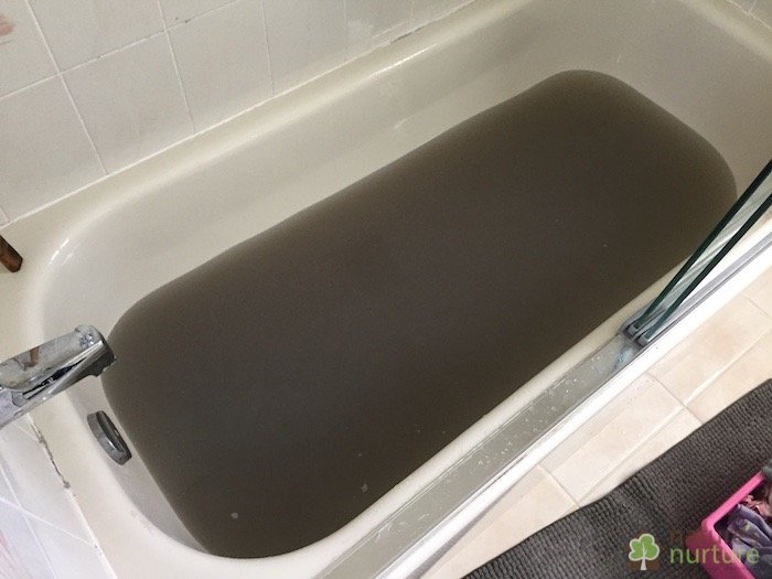 Leftover strip water from stripping a load of light colored laundry. This is what your homemade laundry soap is leaving behind in your fabrics!